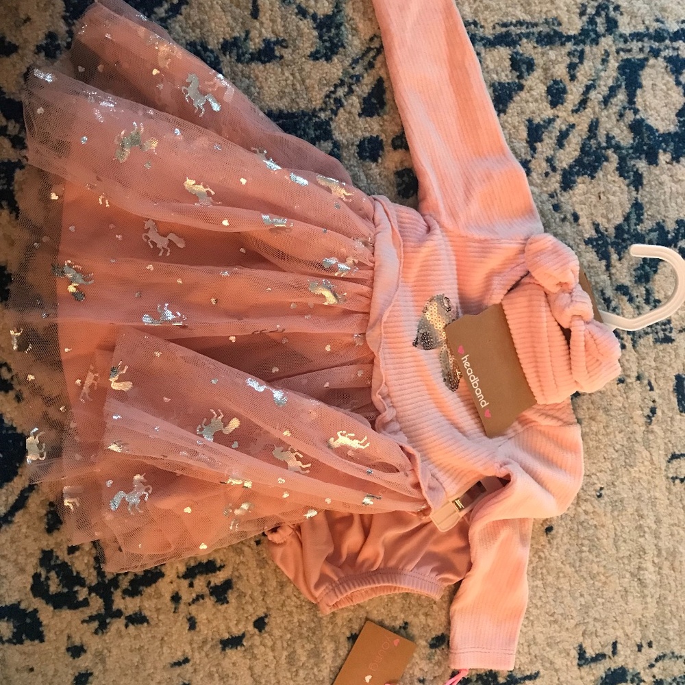 Baby tutu unicorn dress with matching headband and pantys.